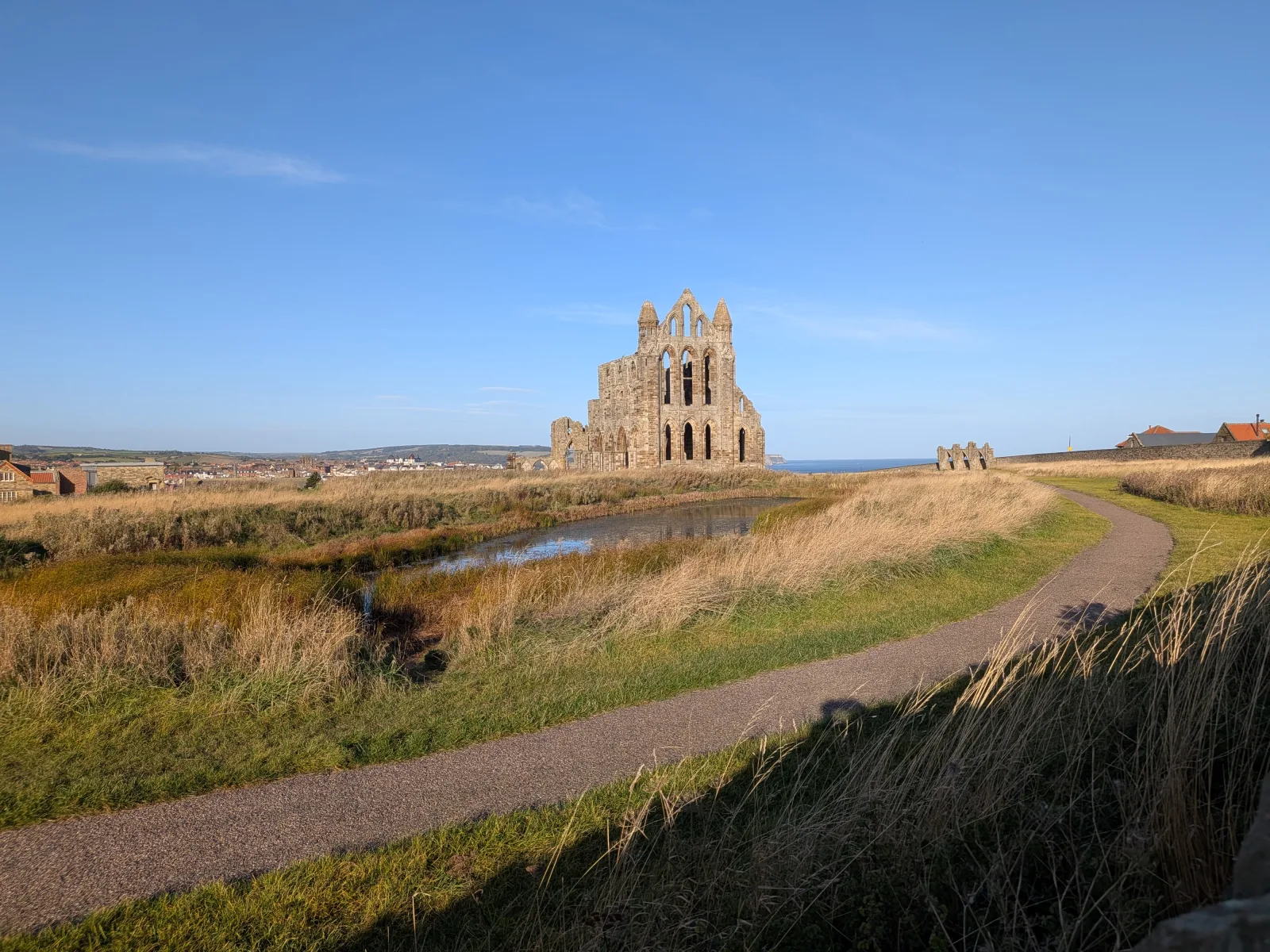The ruins of Whitby Abbey on the headland above the town